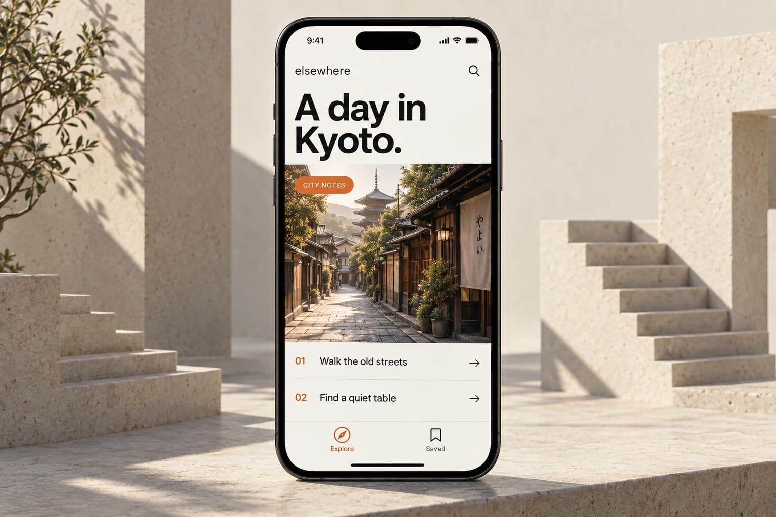 Elsewhere city guide concept with Kyoto photography and a minimal itinerary on an iPhone among pale stone architectural forms
